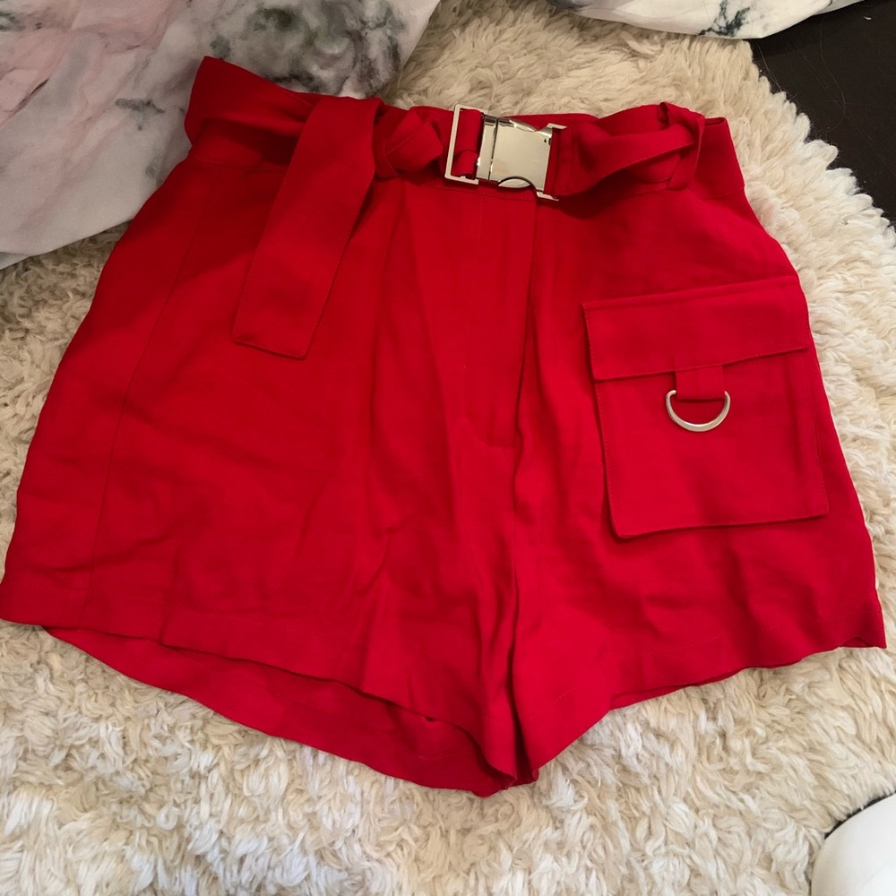 Revolve Red buckle shorts